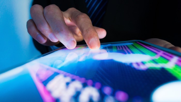 A person using their finger on a screen