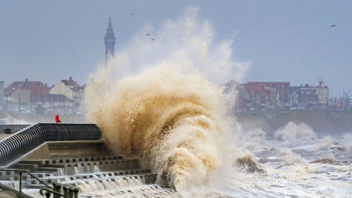 Waves crashing on the seafront at Blackpool