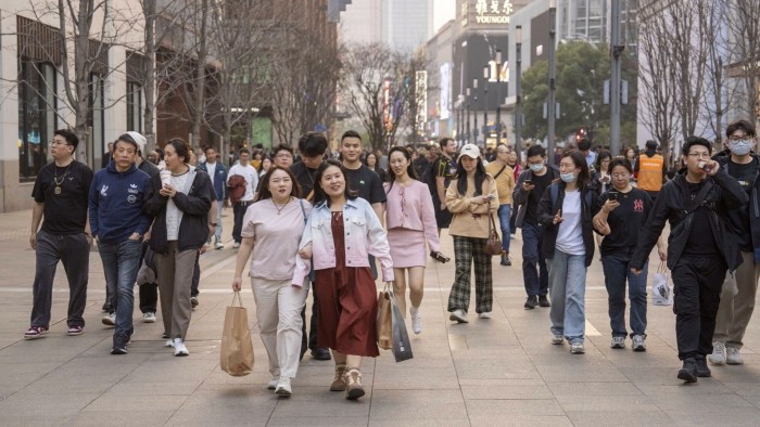Pedestrians in the Nanjing Road West shopping area in Shanghai