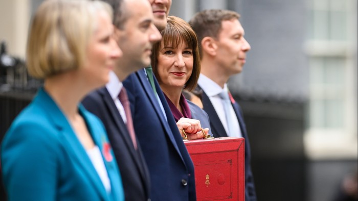 Rachel Reeves holding the red Budget box