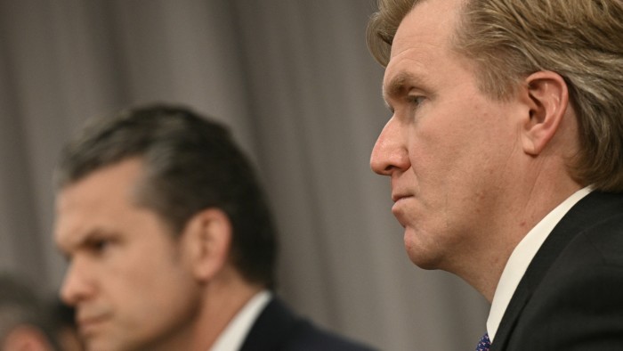 Elbridge Colby, right, with US defence secretary Pete Hegseth during a meeting with ministers of Peru in Washington in May