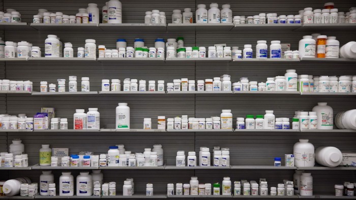 Various prescription drugs stocked on a shelf at a pharmacy in Los Angeles,