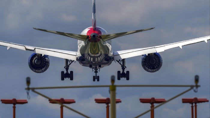 A plane lands at Heathrow airport in London, England