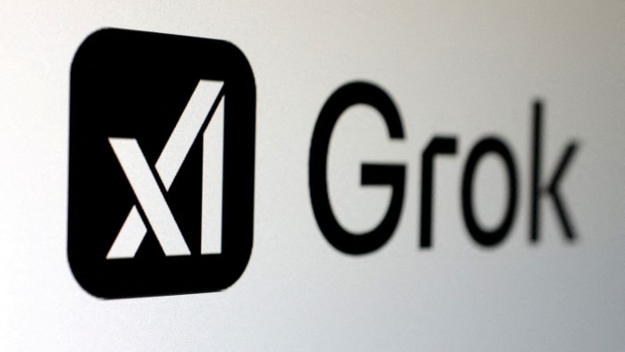 Grok and xAI logos on a wall