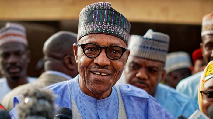 On February 23, 2019, Nigeria’s President Muhammadu Buhari speaks to the media after casting his vote in his hometown of Daura, in northern Nigeria